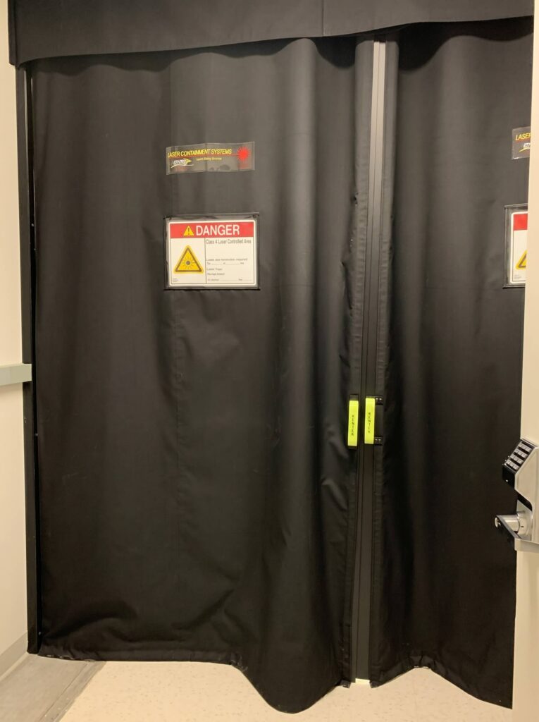 FLEX-GUARD® Curtain with a Rigid Magnetic Door (RMD)