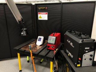 LightWELD work area with Laser Safety Barrier, Eyewear, Warning Sign